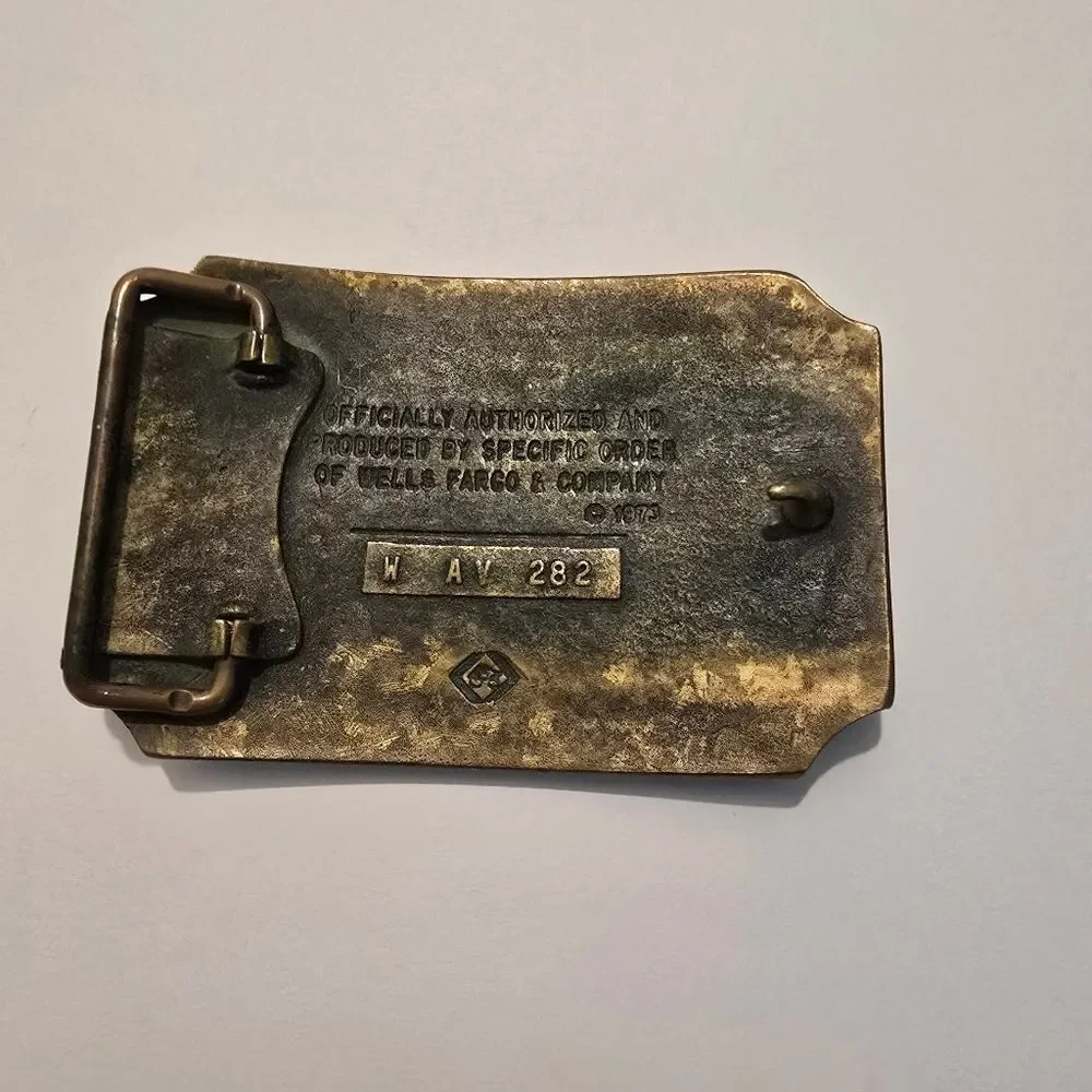 Vintage Wells Fargo‎ & Co.Brass Belt Buckle, likely from 1972.